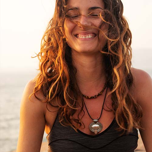Smiling Yogini at the Beach